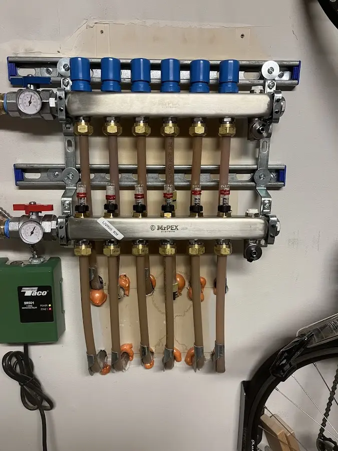 Plumber performing Water Heater Repair at a residential property in Butler